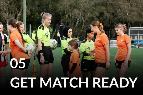 Image shows four female referees smiling and shaking hands with young female players.